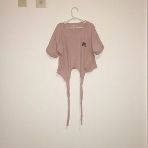A pink crop top.